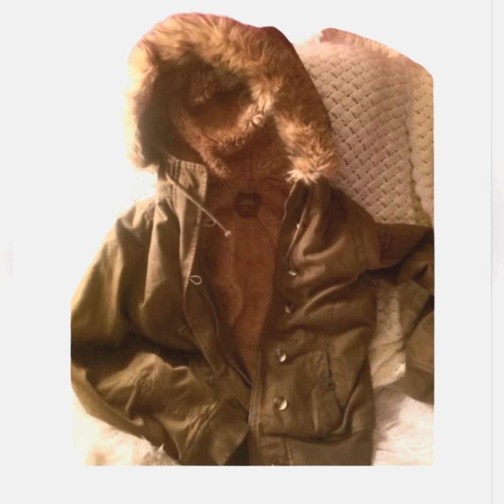 Old Navy green color with  beautiful fur trimmed hood and inside faux fur.